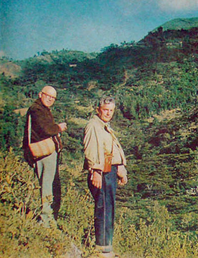 With professor Roger Heim, Wasson (right) searches a mountainside near the village for specimens of the sacred mushrooms.