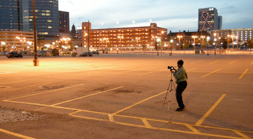 Photographer in parking lot by the Detroit RiverWalk