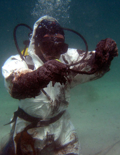 Oil spill diver