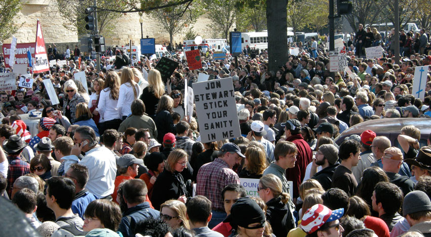 Rally sign stating: Jon Stewart, stick your sanity in me. Photo by Hoayan of America