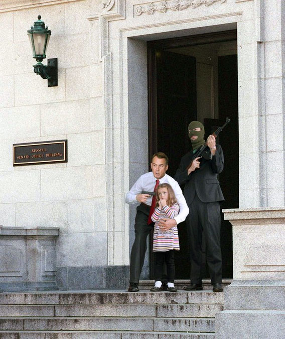 John Boehner points gun at child hostage in front of Congress