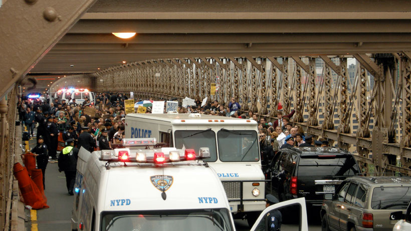NYPD arresting Occupy Wall Street protesters on the Brooklyn Bridge, photo by Haoyan of America