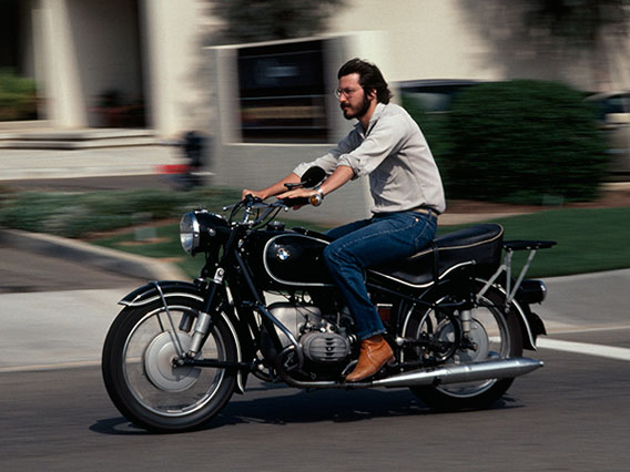 A 27-year-old Steve Jobs rides a boss 1966 BMW motorcyle, photo by Charles O'Rear